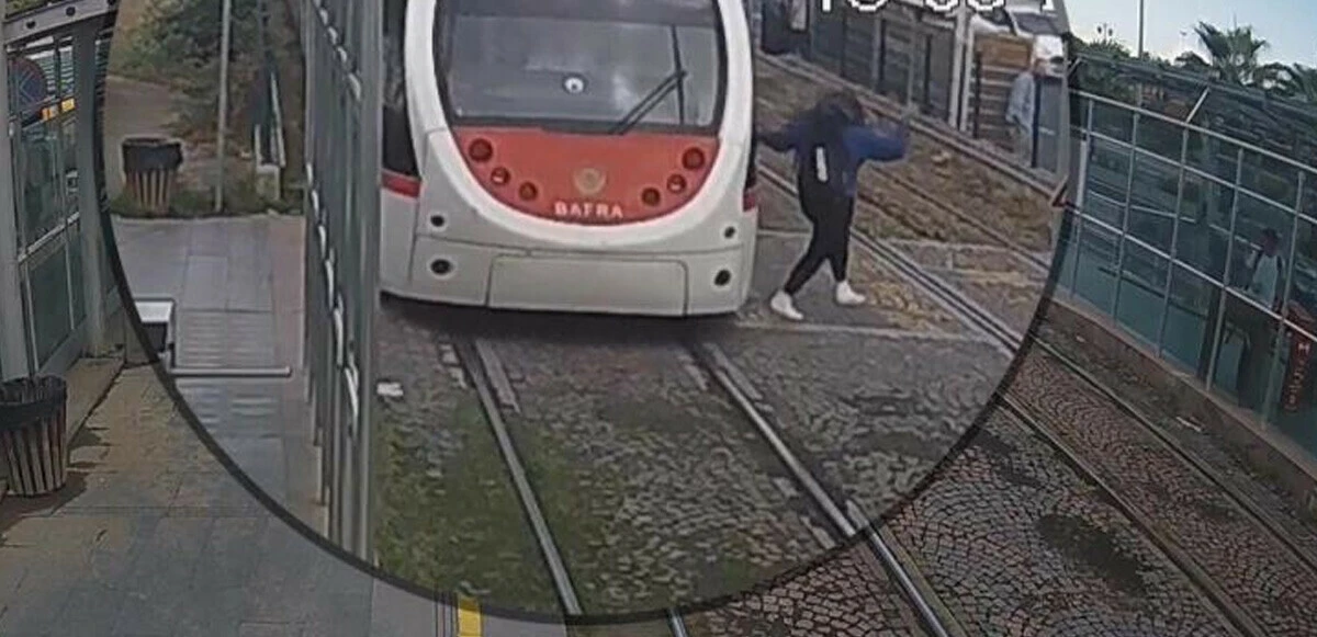 Kulaklığı taktı, 60 tonluk tramvayı duymadı! Vatmanın refleksi genç kızı ölümden kurtardı