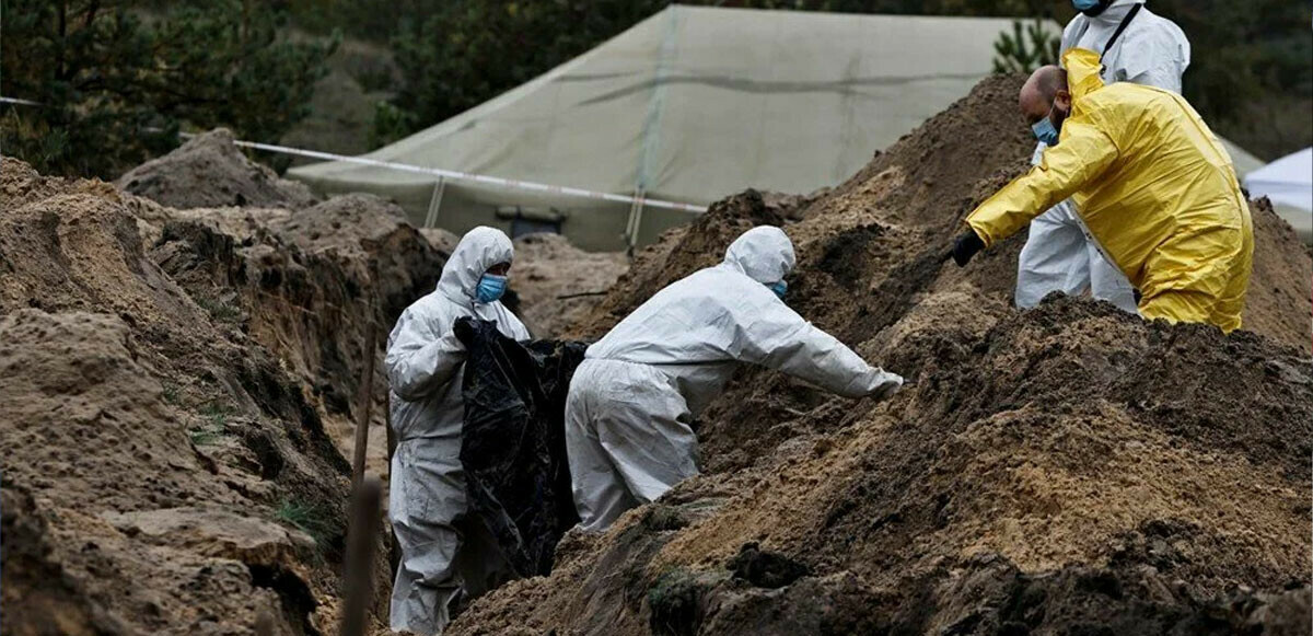 Ruslardan geri alınan Lyman'da sivil katliam: Yeni toplu mezardan 1 yaşındaki bebeğin cesedi çıktı