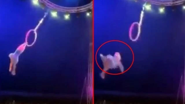 Çemberi yakalayamayınca metrelerce yüksekten yere çakıldı! Akrobatın korkutan anları kameralara yansıdı