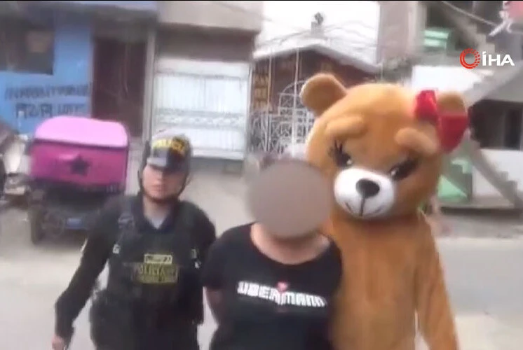Polisten 'romantik' operasyon: Ayı kostümüyle kıskıvrak yakaladı - 1. Resim