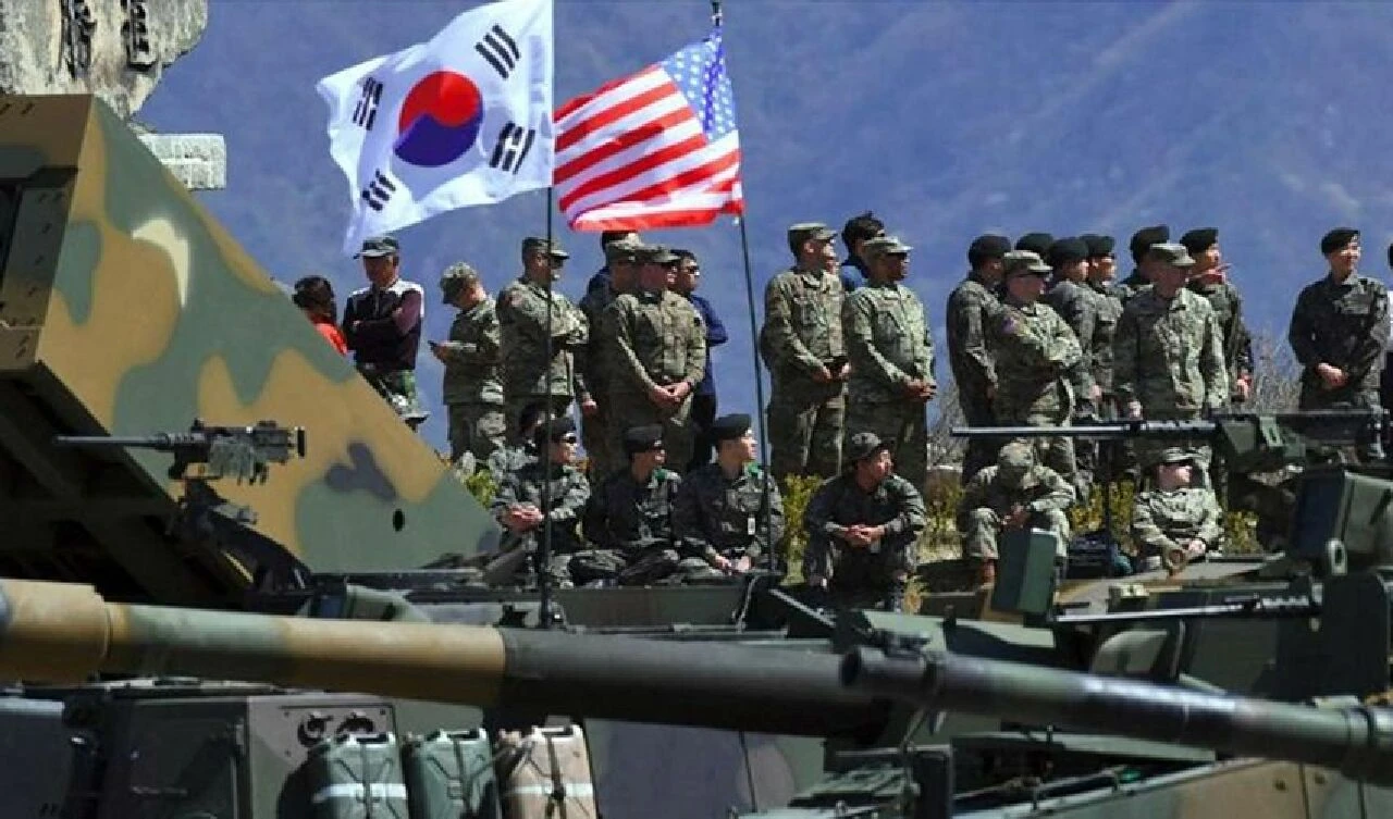 Kuzey Kore savaşla barış arasındaki ince çizgide! Dev tatbikatla sinyali verdi