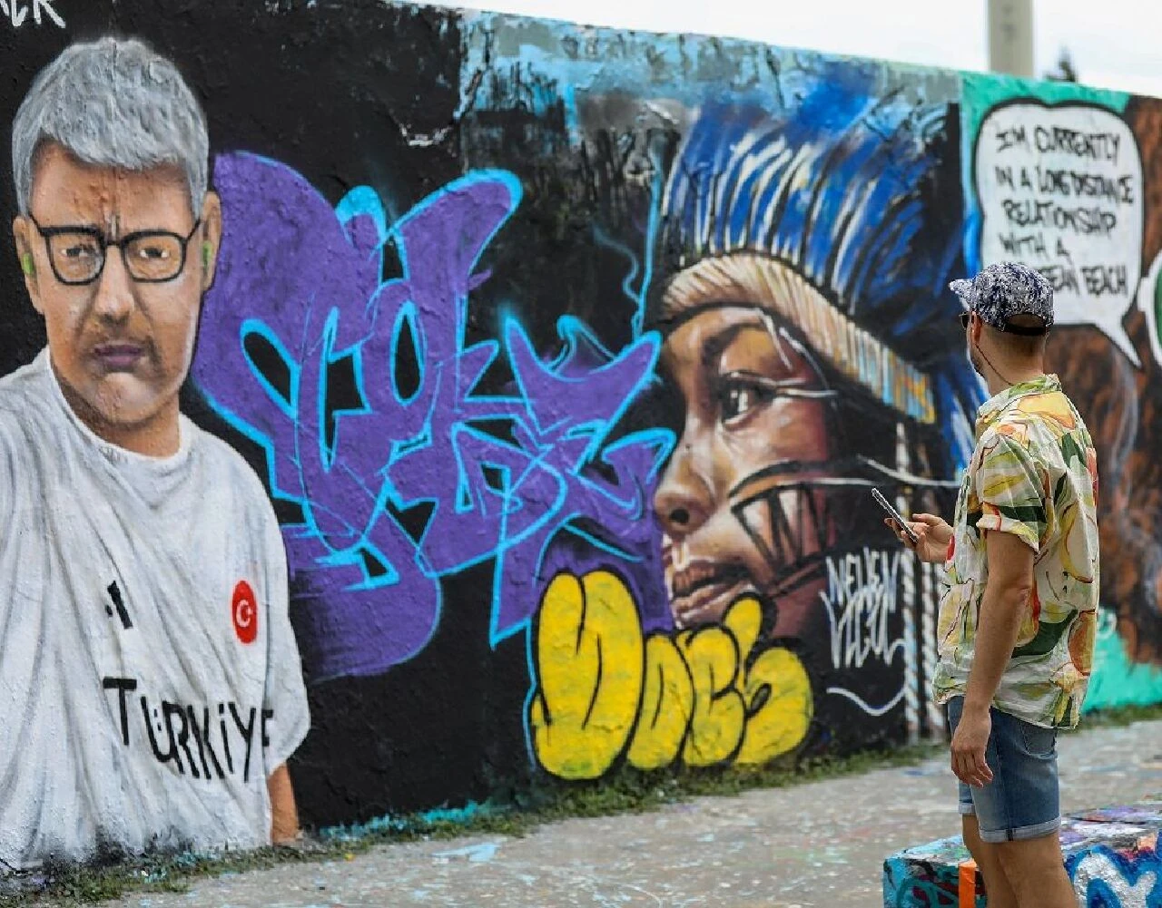 Dünyanın konuştuğu atıcımız Yusuf Dikeç'in namı Almanya sokaklarına taştı! Gören fotoğraf çekiyor - 2. Resim