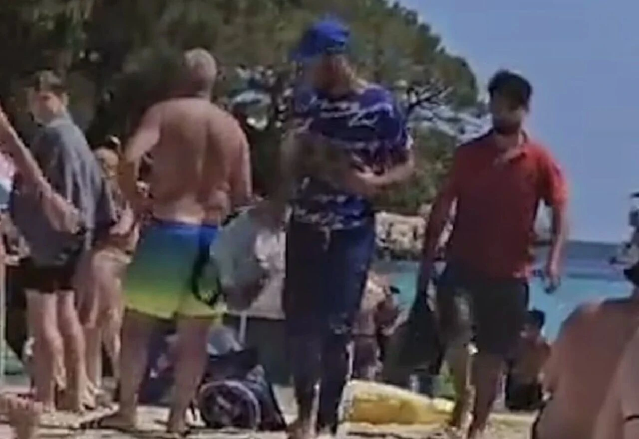 İspanya'da plajda güneşlenenlere şok baskın! Kaçak göçmenler çıkarma yaptı