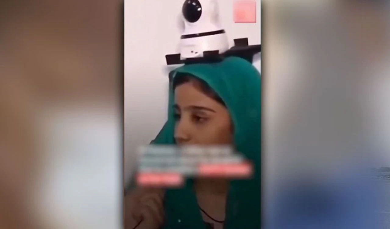 Kızını korumak için kafasına güvenlik kamerası taktı! Pakistanlı babadan akılalmaz önlem - 1. Resim