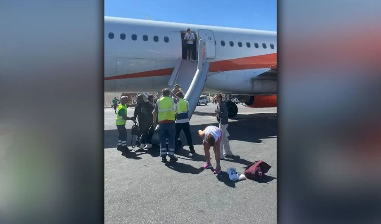 Uçak kabinini bir anda duman kapladı! 236 yolcu bomba paniğiyle kaçıştı, gerçek ortaya çıktı - 2. Resim