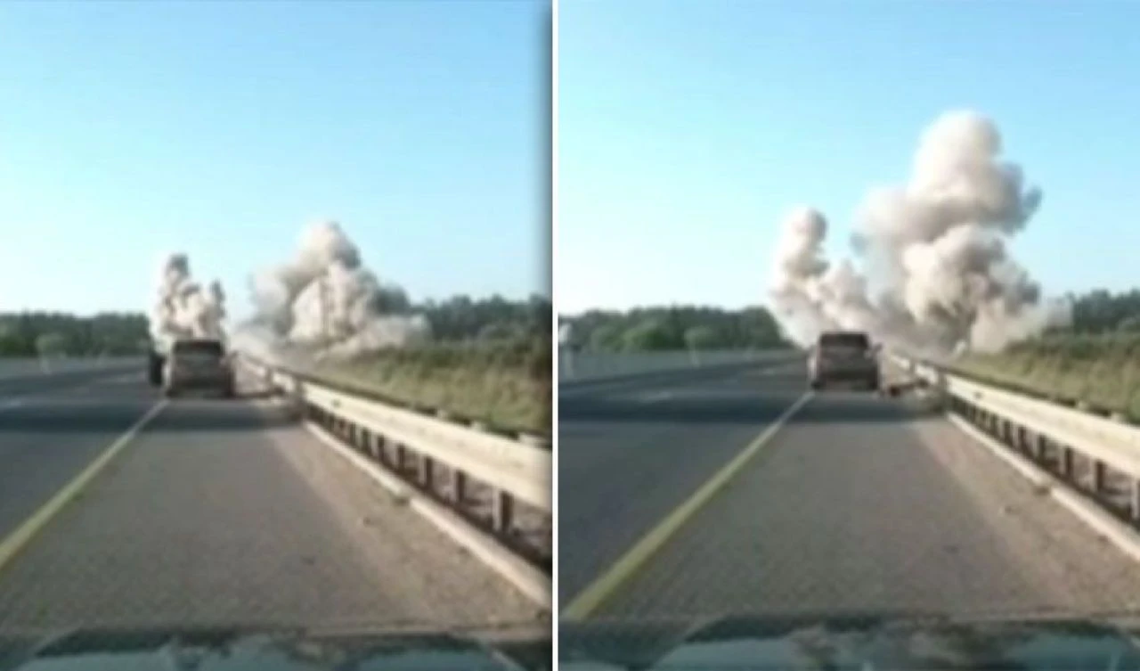 İsrail'in Demir Kubbe'sini atlatan roket otoyoldaki aracın önüne böyle düştü - 2. Resim
