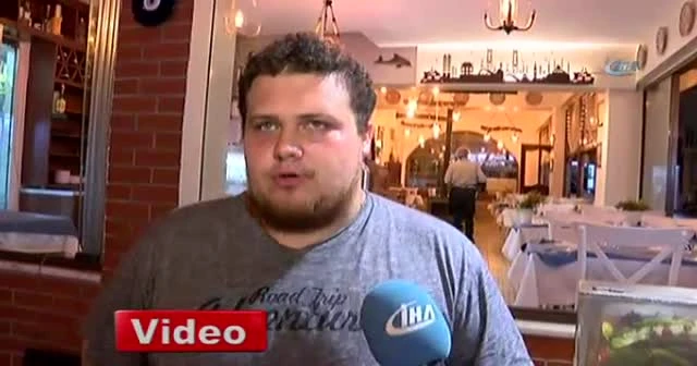 Çaldığı balığı pantolonun içine sakladı