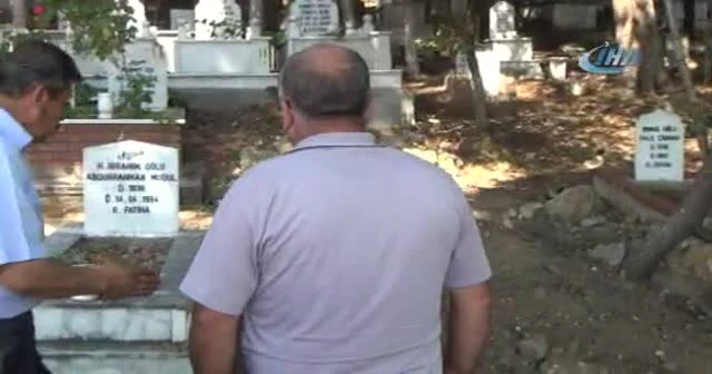 Mezar taşını söküp yanına "Bu iş bitmedi" yazılı tabela diktiler