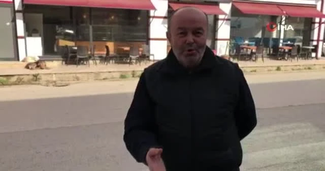 Köpeklerin saldırısına uğrayan çocuğu esnaf kurtardı