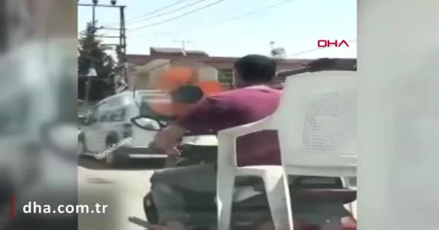 Sıcaktan bunalan sürücü, motosikletin önüne pervane taktı
