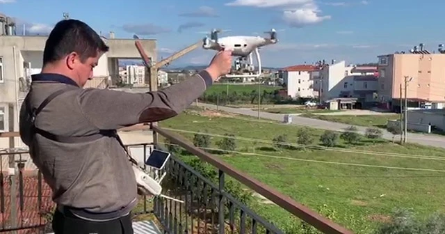 Evden çıkamadı, alışveriş için evden markete drone yolladı