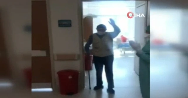 80 yaşında korona virüsü yenerek alkışlarla taburcu oldu