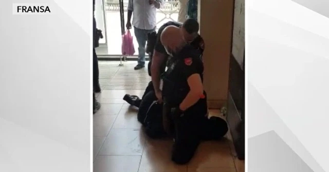 Fransa'yı karıştıran görüntü! Hamile kadına ters kelepçe taktılar