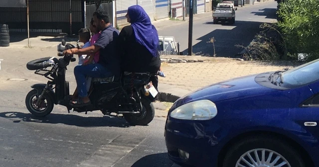 Elektrikli bisiklet üzerine 5 kişi bindiler