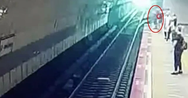 Iraklı genç, raylara böyle atladı