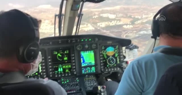 Bakan Pakdemirli, Hatay'daki orman yangınını havadan inceledi