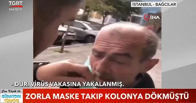 Zorla kolonya döküp maske taktırmıştı