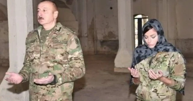 Aliyev ve eşinden örnek hareket