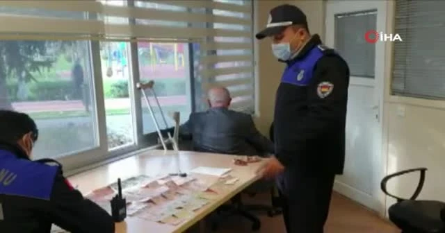Dilencinin üstünden çıkan paralar şoke etti