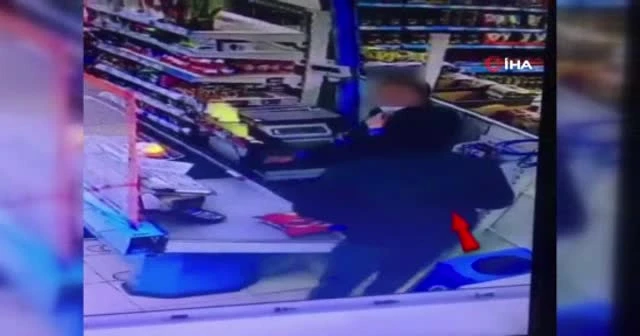 Müşteri gibi gelip silah çekerek marketi soydu