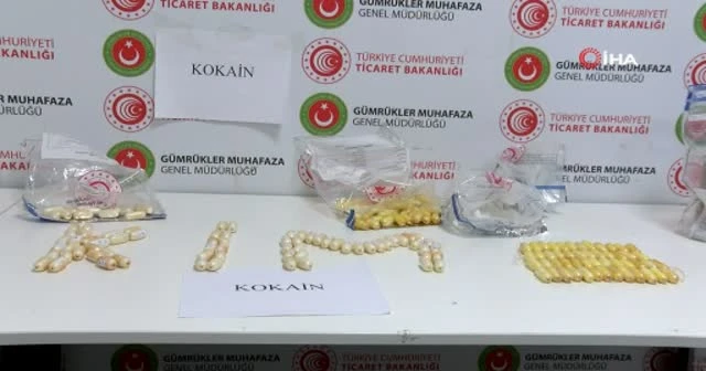 Midelerinden 4 kiloya yakın uyuşturucu çıktı