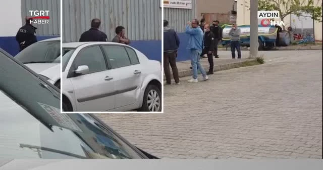 Polis kafasına dayadığı tüfeği böyle aldı