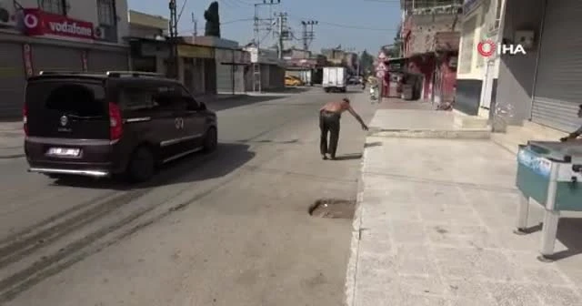 Tam kapanmada sokakta kaldı, ortalığı birbirine kattı