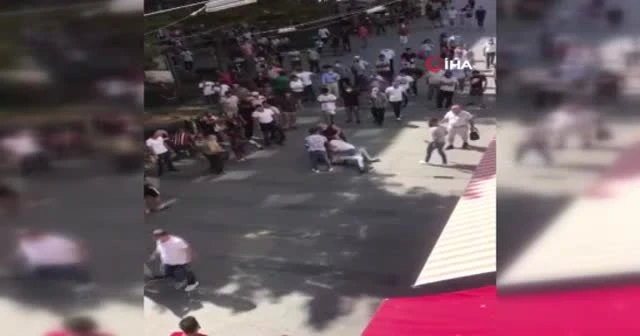 Öfkeli kadın eşini darp eden genci dövdü