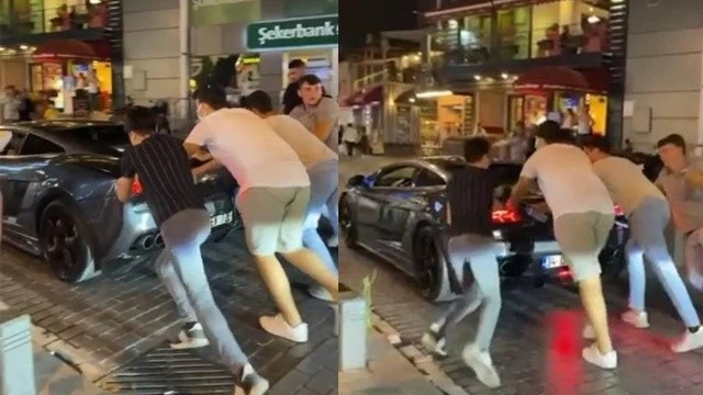 Yolda kalan Lamborghini'yi vatandaşlar yürüttü