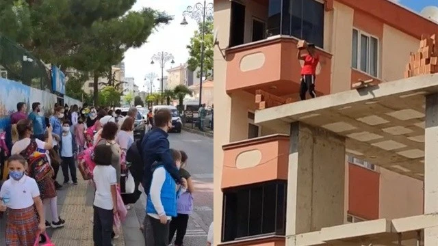 Çatıya çıkıp öğrencilerin geçtiği yola tuğla fırlattı