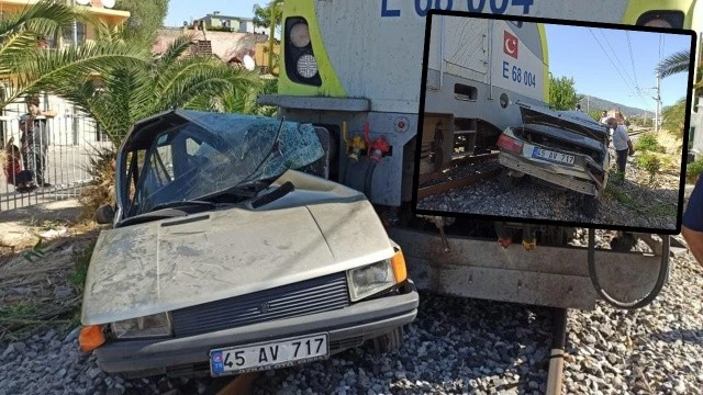 Trenin biçtiği otomobilden sağ çıktı