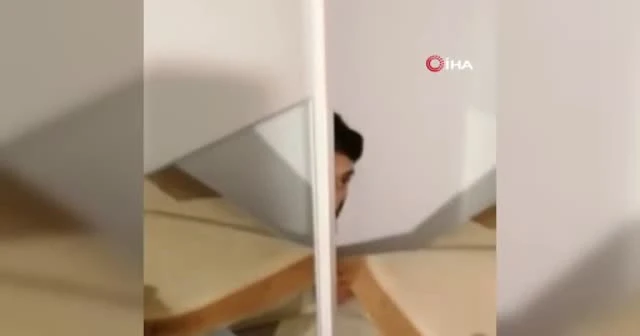 Uyuşturucu şüphelisi halı arkasında yakalandı