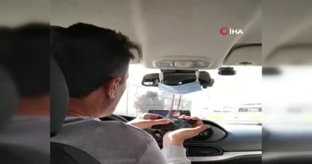 Taksici seyir halinde iken at yarışı izledi