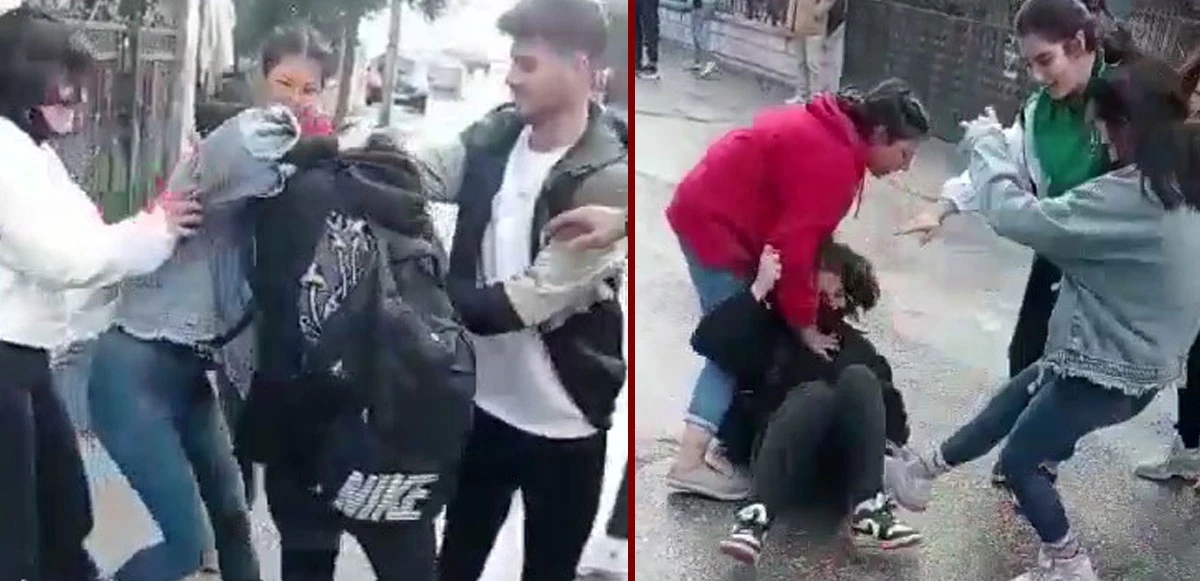 Liseli kızlar saç baş kavga etti, erkekler ayırmak yerine videoya çekti