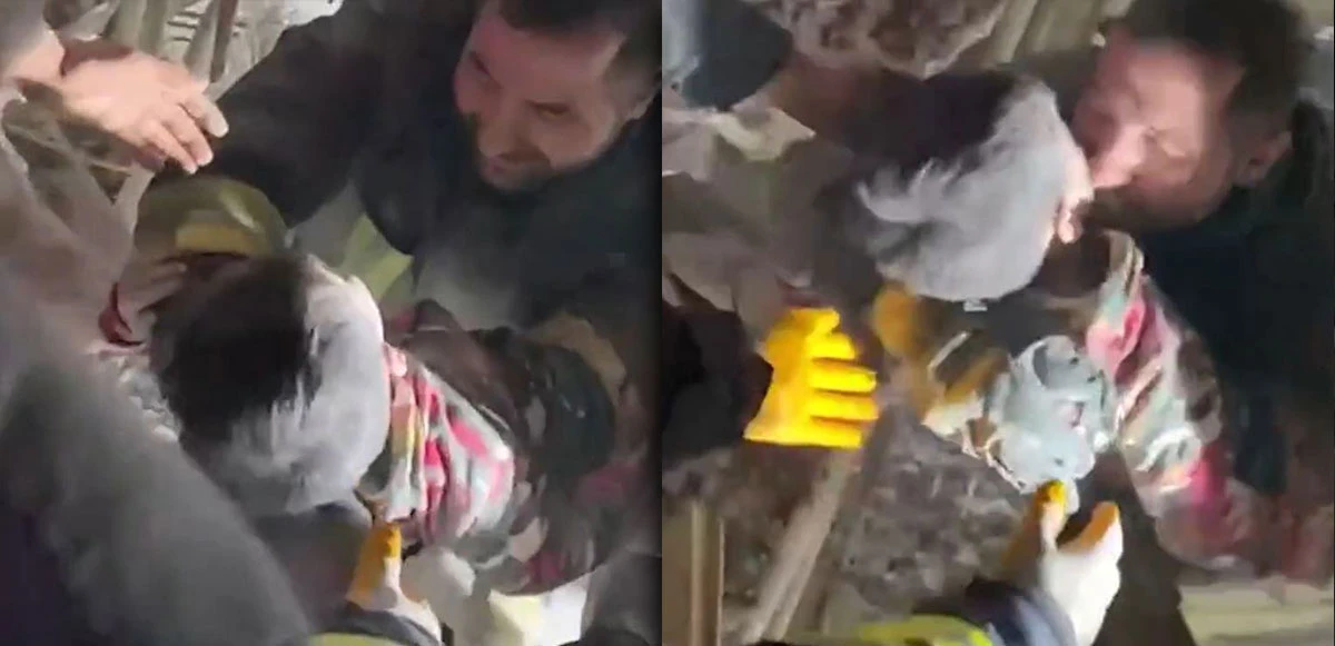 İtfaiye erinden umut öpücüğü: Saatler sonra enkazdan çıkarılan minik Miran ekiplerin sevinci oldu