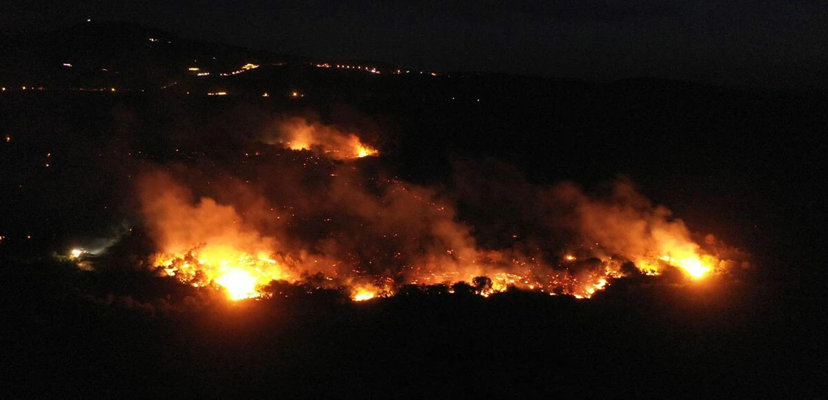 Kaş'taki yangın yeniden başladı: Alevler seralara sıçradı
